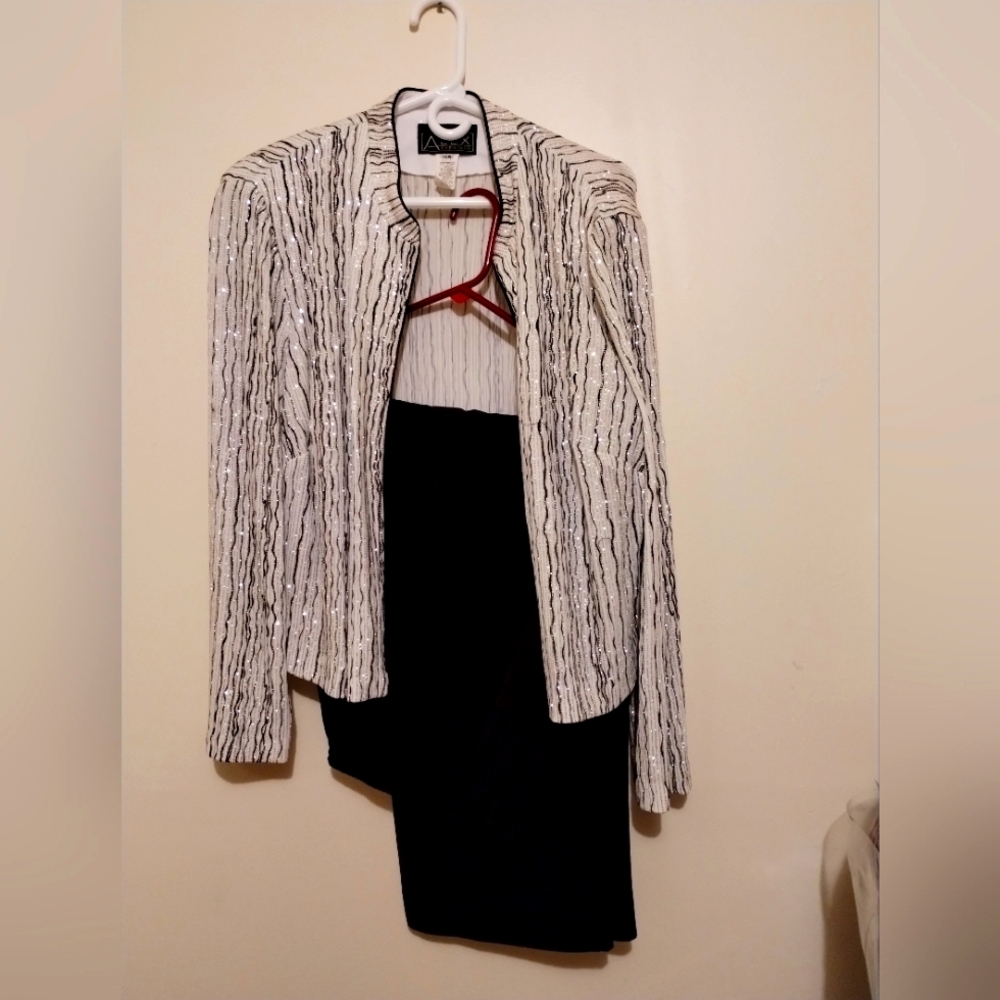 Two piece evening pant suit.